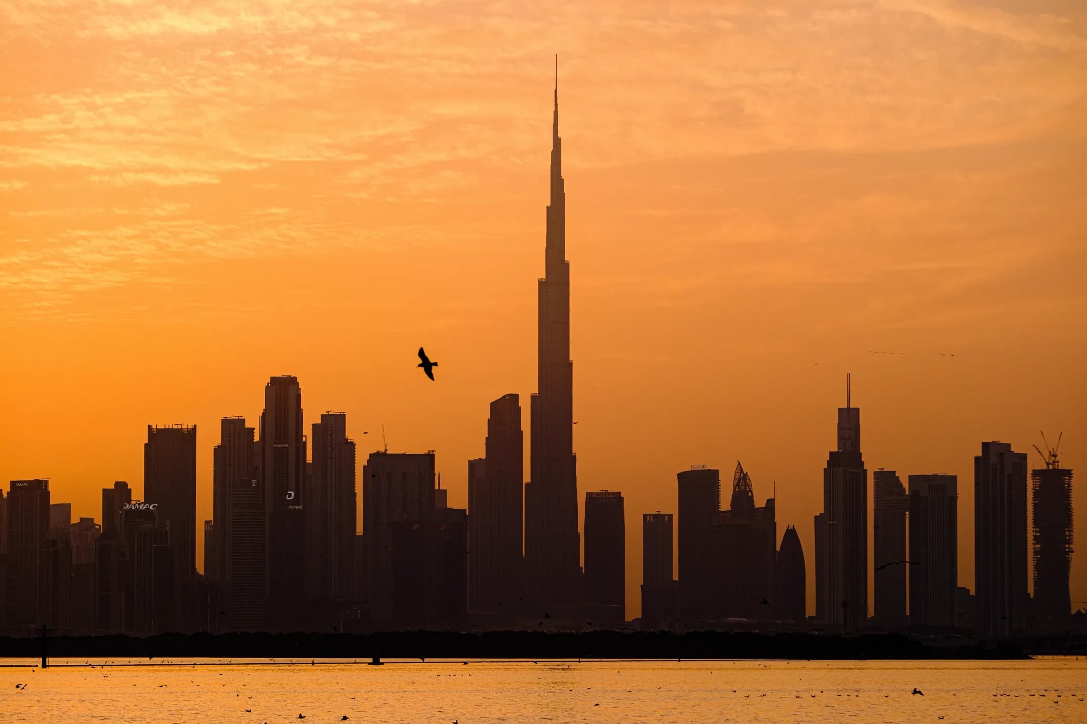 Burj Khalifa and Downtown Dubai skyline at golden hour